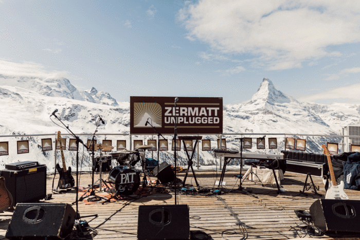 Zermatt Unplugged music festival set-up on a lodge deck overlooking the Matterhorn
