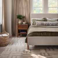 The Citizenry Rabani handwoven area rug in a bedroom setting